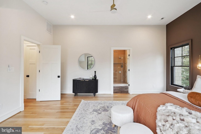 bedroom featuring light wood-type flooring, visible vents, baseboards, and recessed lighting