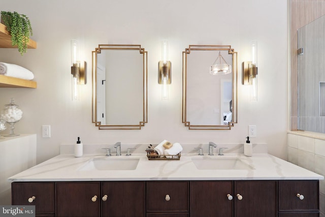 bathroom with double vanity and a sink