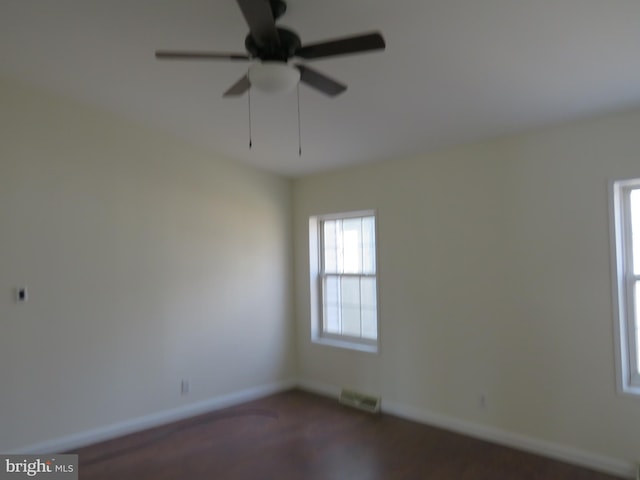 unfurnished room with ceiling fan