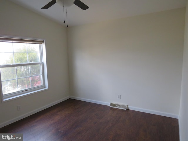 unfurnished room with ceiling fan, lofted ceiling, and dark hardwood / wood-style floors