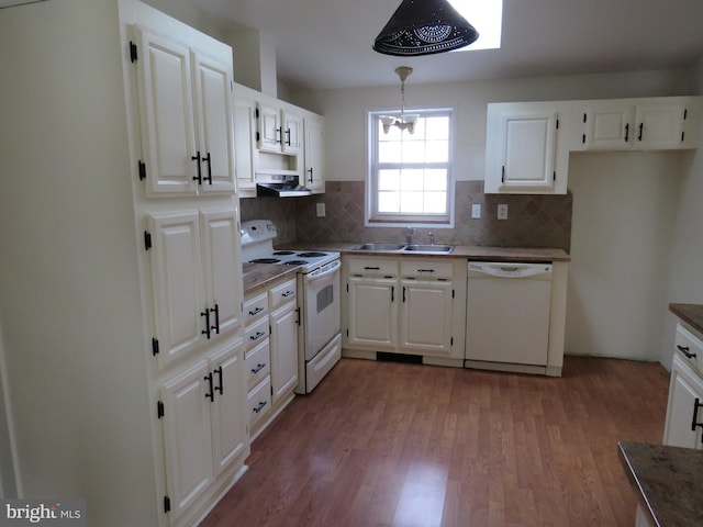 kitchen with white cabinetry, white appliances, pendant lighting, and exhaust hood