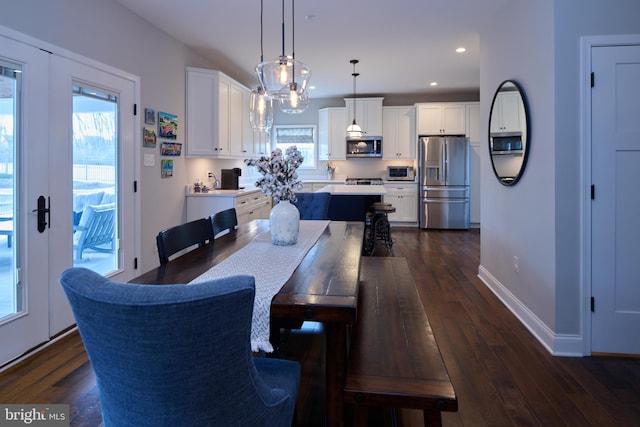 dining room featuring dark hardwood / wood-style floors and french doors