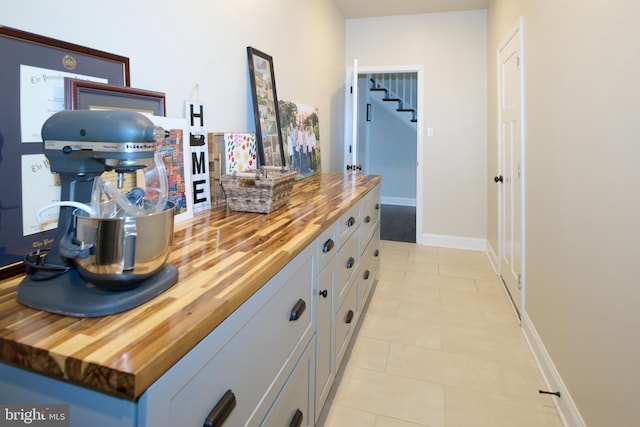 interior space featuring light tile patterned floors