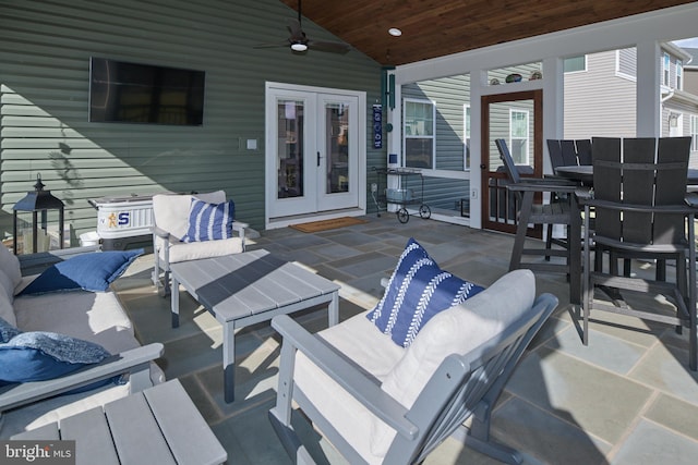 view of patio with french doors, ceiling fan, and outdoor lounge area