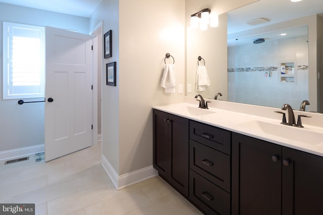 bathroom featuring vanity and tile patterned flooring