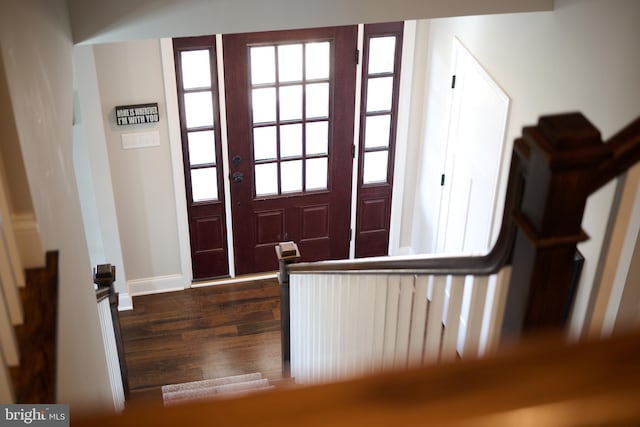 entryway featuring dark wood-type flooring