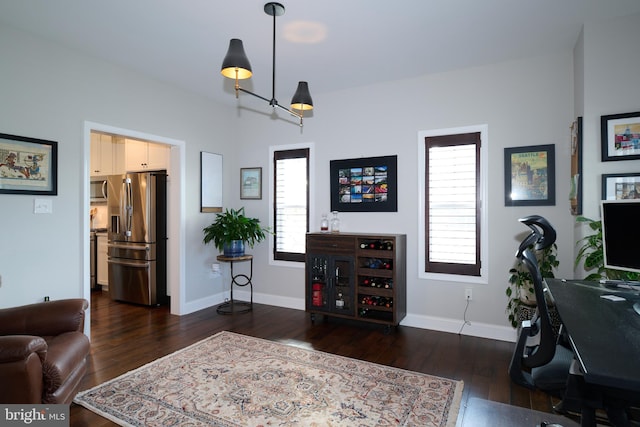 home office featuring dark hardwood / wood-style flooring