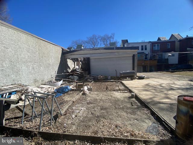 view of yard featuring a garage