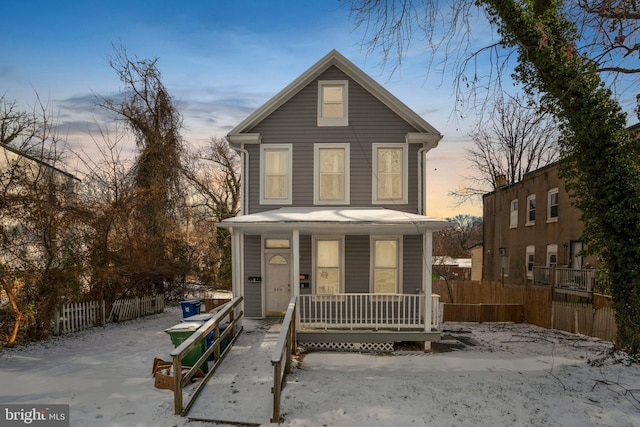 view of property with covered porch