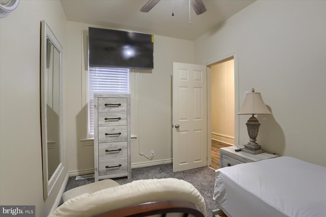 carpeted bedroom with ceiling fan