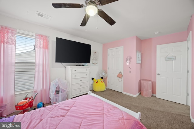 bedroom with ceiling fan and carpet