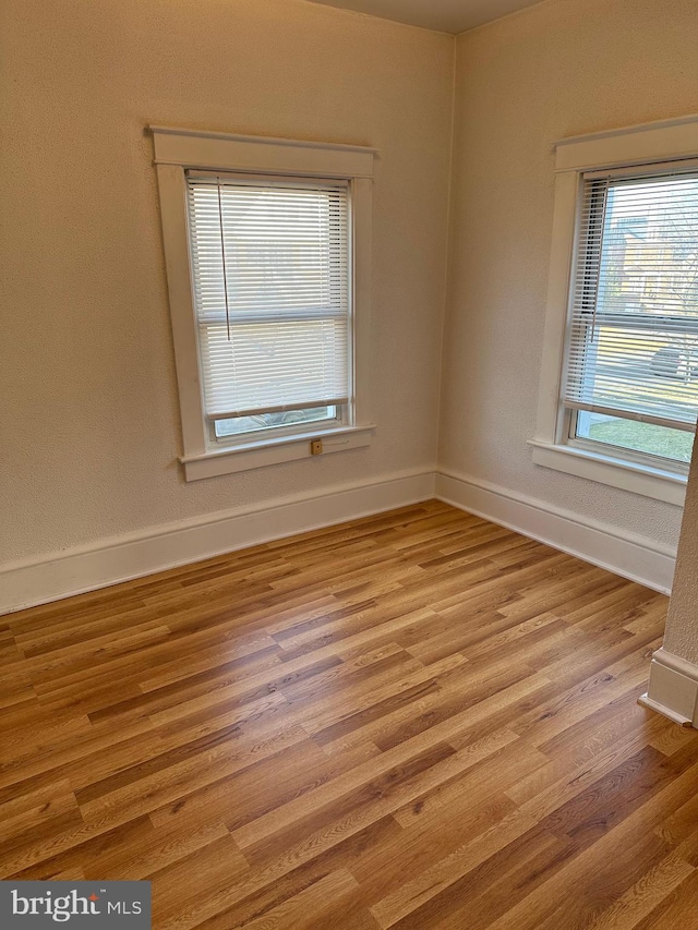 empty room featuring light hardwood / wood-style floors