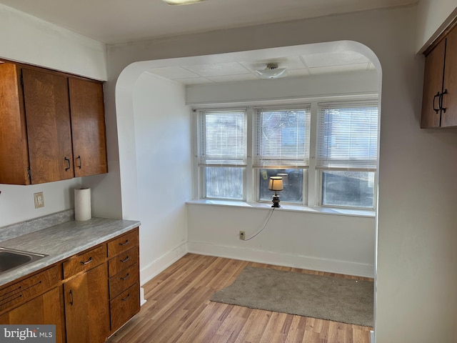 kitchen with light hardwood / wood-style flooring