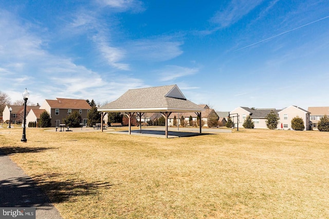 exterior space featuring a yard and a gazebo