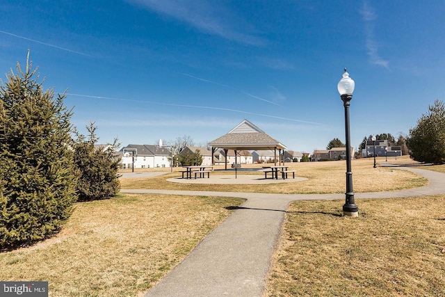 view of home's community with a gazebo and a lawn