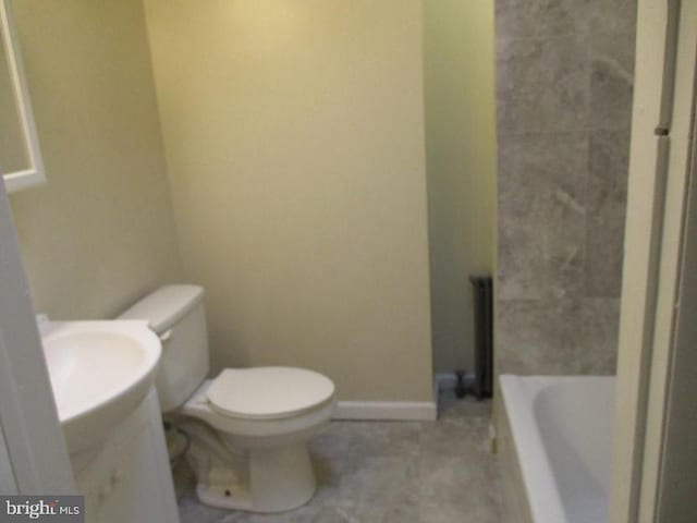 bathroom featuring shower with separate bathtub and toilet