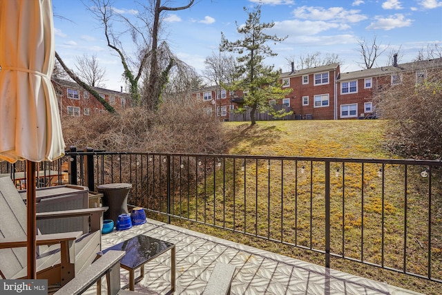 balcony featuring a residential view