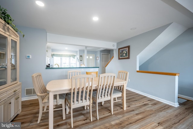 dining room featuring light wood-type flooring