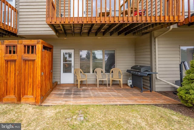 view of patio / terrace featuring a deck and grilling area