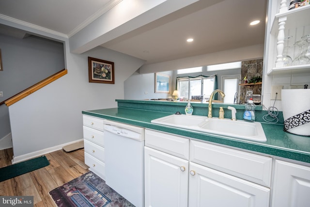 kitchen featuring white cabinetry, sink, ornamental molding, white dishwasher, and light hardwood / wood-style flooring