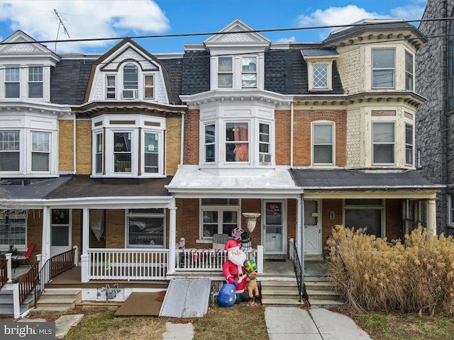 multi unit property featuring covered porch