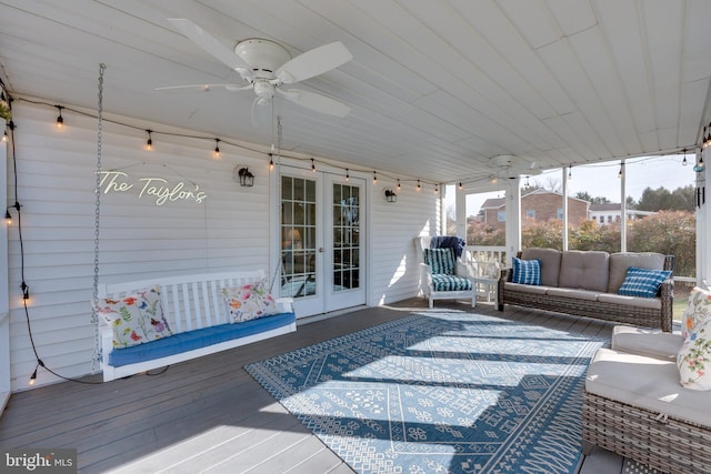 sunroom / solarium with ceiling fan