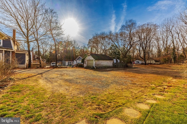 view of yard featuring a garage