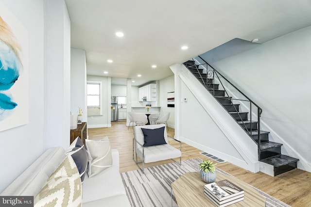 living room featuring light hardwood / wood-style flooring