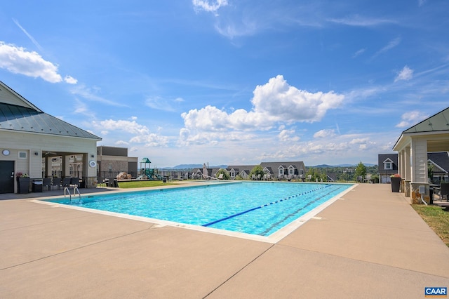 view of pool featuring a patio