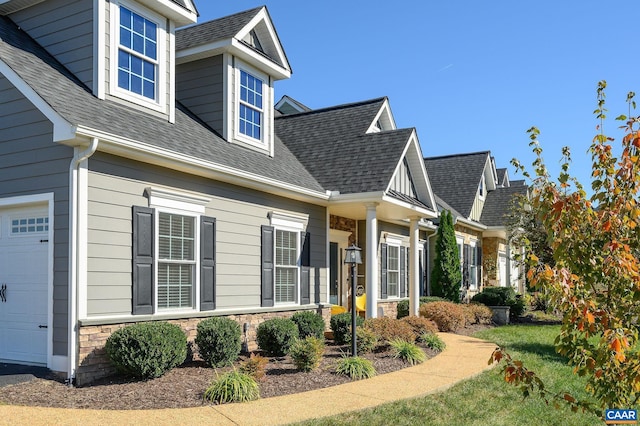 view of front of property with a garage