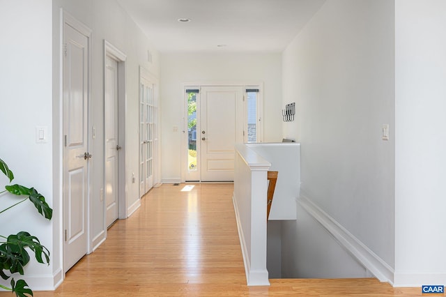 hall featuring light wood-type flooring