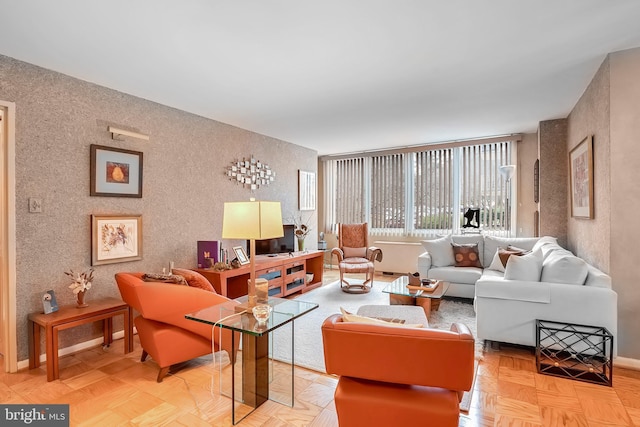 living room featuring light parquet floors