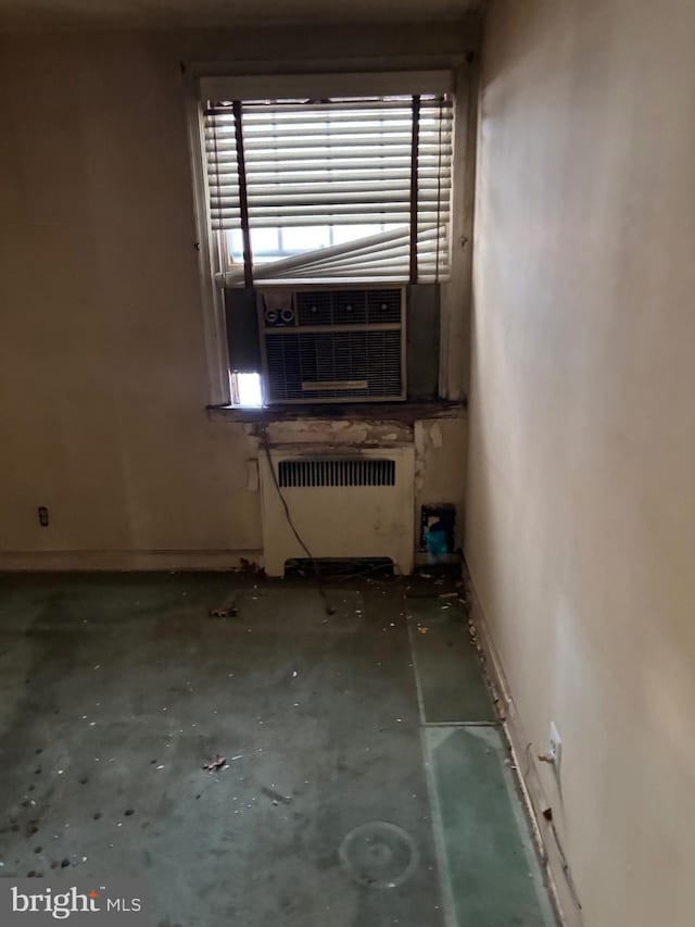 spare room with radiator heating unit