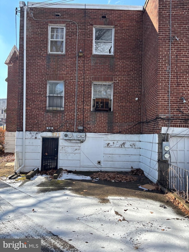 view of home's exterior with cooling unit