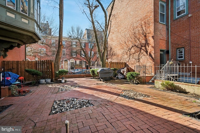 view of patio featuring a grill