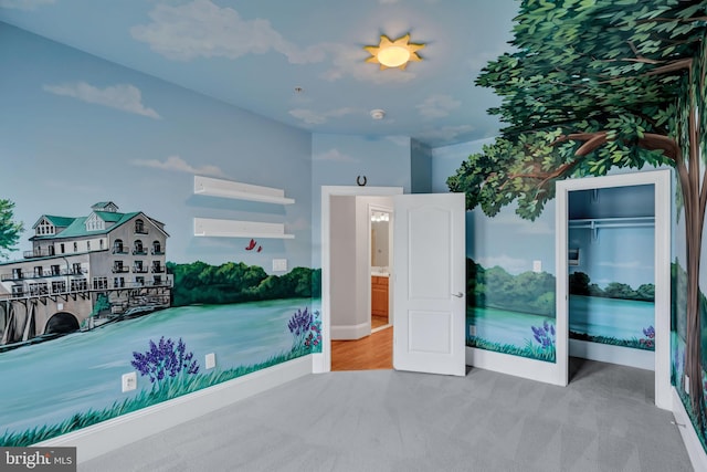 carpeted bedroom featuring a closet