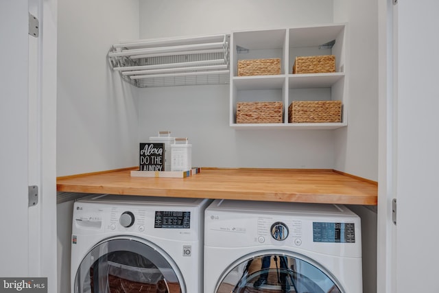 washroom featuring washer and dryer