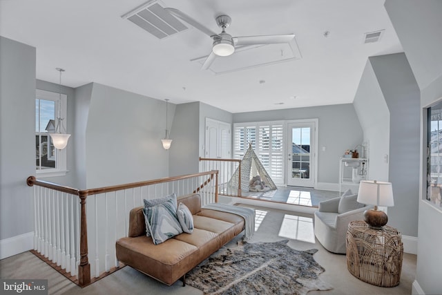 sitting room with light colored carpet