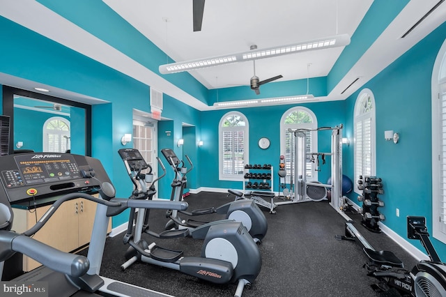 workout area with ceiling fan