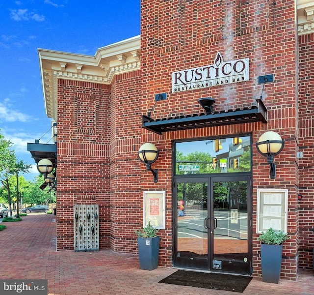 entrance to property featuring french doors