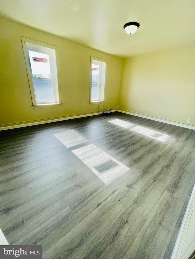 empty room featuring hardwood / wood-style flooring