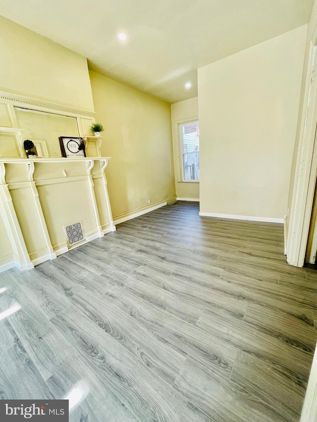 unfurnished living room featuring light wood-type flooring