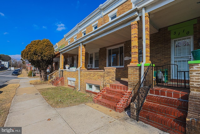 view of property exterior featuring a porch