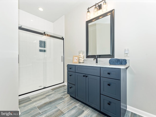 bathroom with vanity and walk in shower