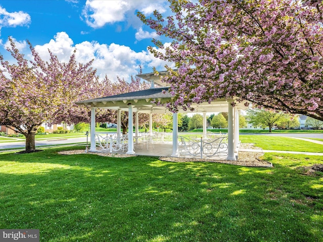 view of home's community with a gazebo and a lawn