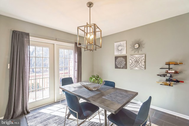 dining room featuring a chandelier