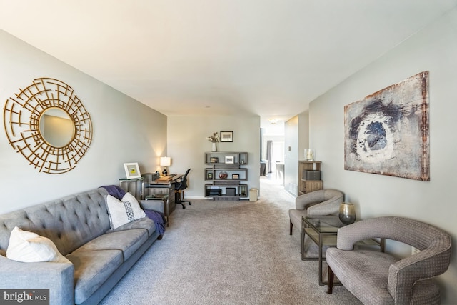 living room featuring light carpet