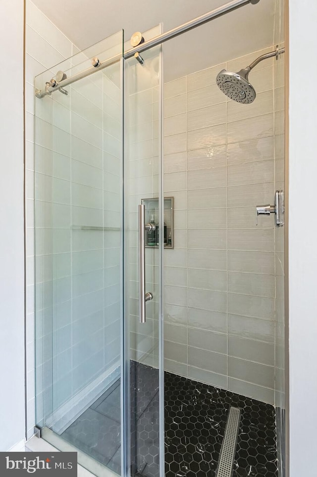 bathroom with an enclosed shower