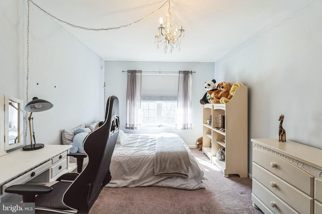 carpeted bedroom featuring a notable chandelier