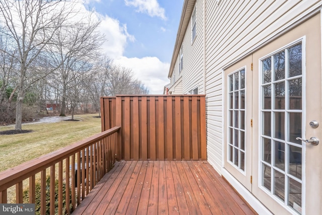 wooden deck with a yard